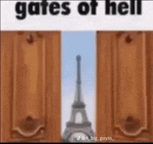 a picture of the eiffel tower behind a wooden door with the words `` gates of hell '' written on it .