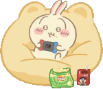 a cartoon rabbit is sitting on a pillow holding a nintendo switch .