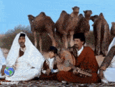 a group of people playing instruments in front of a group of camels with the words love geography on the bottom