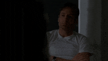 a man with his arms crossed says no