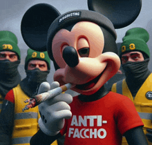 mickey mouse smoking a cigarette and wearing a red shirt that says anti-facco