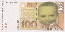 a 100 kuna bill with a picture of a boy on it .