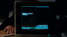 a computer monitor displaying the word intel on the screen