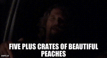 a man wearing sunglasses is sitting in a dark room with the words five plus crates of beautiful peaches above him .