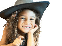 a little girl with curly hair wearing a black cowboy hat