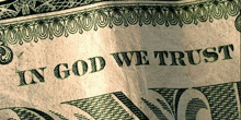 a dollar bill with the words in god we trust on it