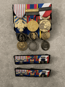 a collection of medals and ribbons including one that says " republique francaise " on it