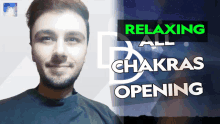 a man is smiling in front of a relaxing all chakras opening poster