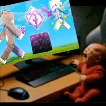 a baby is crying in front of a computer screen showing a minecraft game