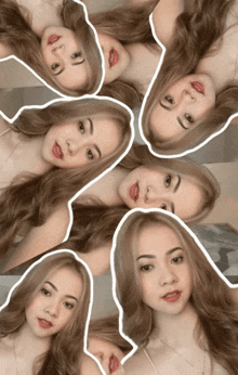 a collage of a woman 's faces is displayed on a wall