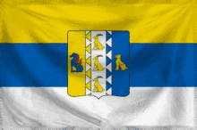 a yellow blue and white flag with a coat of arms on it