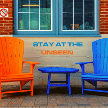 a sign that says " stay at the unseen " on a wall