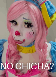 a woman dressed as a clown with the words " no chicha " above her