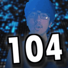 a man wearing glasses and the number 104