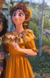 a woman in a yellow dress is standing next to a man in a green shirt