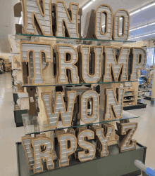 a display of wooden letters including the letters rpsyz