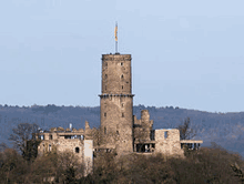 a castle with a flag on top of it