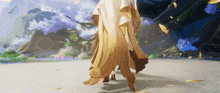 a person in a white and gold outfit is walking on a path