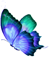 a blue and green butterfly is flying in the air