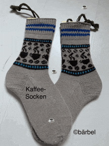 a pair of socks that say kaffee-socken