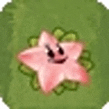 a pink flower with a face on it is surrounded by green leaves .