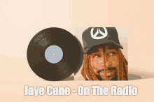 a picture of a man with dreadlocks next to a record labeled jaye cane on the radio