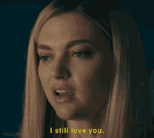 a woman says " i still love you " in a gif