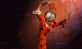 a cartoon character in a red polka dot dress