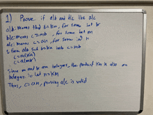 a white board has a mathematical problem on it