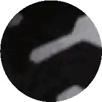 a black and white image of a circle with smoke coming out of it .