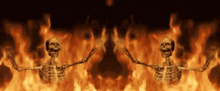 two skeletons dancing in front of a fire