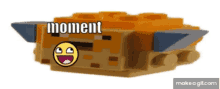 a lego block with a smiley face and the words " moment " on it