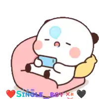 a panda bear is sitting on a pillow playing a video game