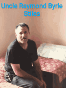 a man sitting on a bed with the name uncle raymond byrle stiles on the bottom