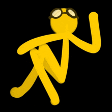 a yellow stick figure wearing goggles is sitting on a black surface