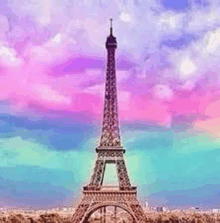 the eiffel tower is surrounded by a pink and blue sky .