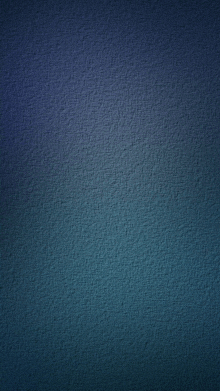 a close up of a blue wall with a texture