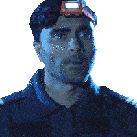 a man wearing a headband with a light on top of it