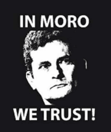 a black and white photo of a man with the words `` in moro we trust '' written below him .