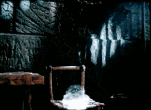 a dark room with a clock on the wall and a light coming out of a hole