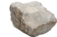 a large rock on a white background with a few smaller rocks in the background