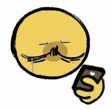 a yellow smiley face is holding a cell phone in its hand .