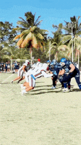 a group of football players are lined up on a field and one of them has the number 7 on his jersey