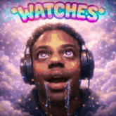 a man wearing headphones looks up at the word watches above him