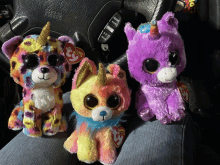 three beanie boos are sitting next to each other