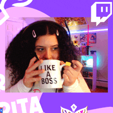 a woman wearing headphones is drinking from a mug that says like a boss