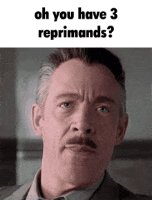 a man with a mustache is making a funny face with the words oh you have 3 reprimands
