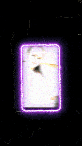 a blurry picture of a woman in a white dress with a purple frame