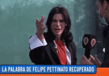 a woman holding a microphone with the words la palabra de felipe pettinato recuperado