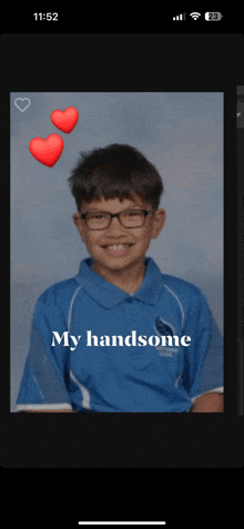 a phone screen shows a picture of a young boy with glasses and the words my handsome